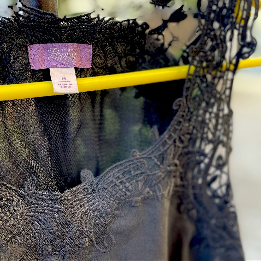 “Truly poopy “  and “Trina Turk “ black tops